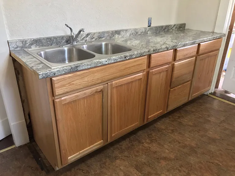 Brand new kitchen cabinets and countertop.