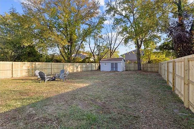 Welcoming backyard to relax around a cozy firepit