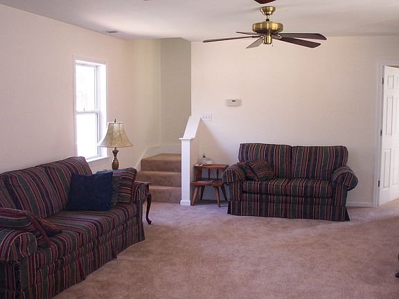 Still by Kit. looking at other side of greatroom;stairs lead to master retreat