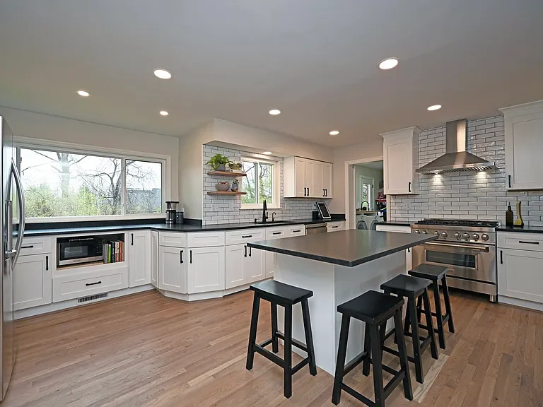 Kitchen remodel 2023 to the studs - Gas range, granite, cabinets, floors, windows opened wall to dining