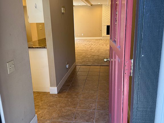 Entry way - half-bath is to the right of the red door