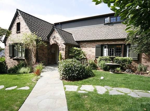 1937 Brick Home.  Large and private front yard.