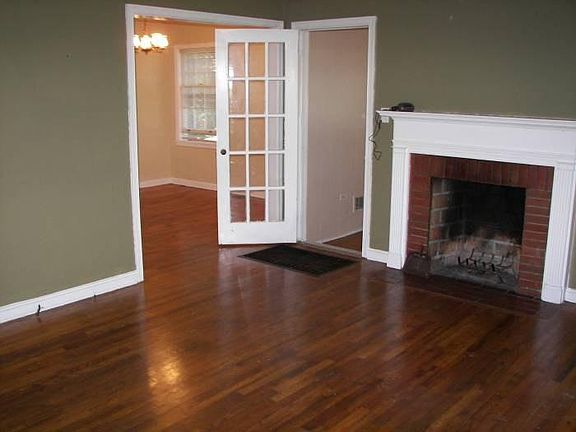 living room with fireplac