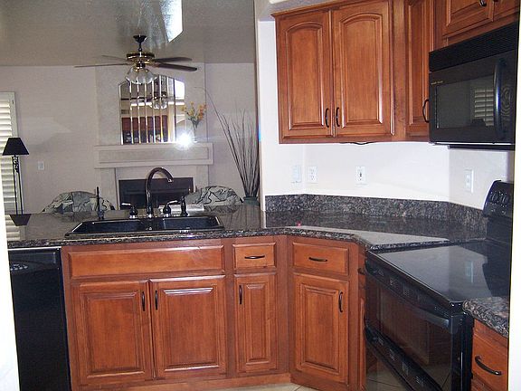 Luxury granite and cherry cabinets