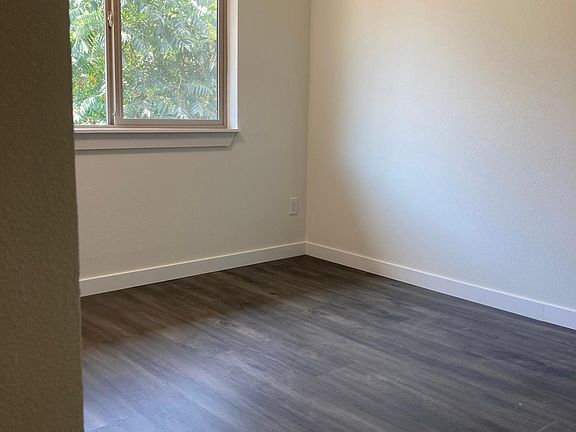 Bright upstairs bedroom with ample closet space.