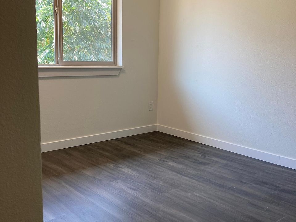 Bright upstairs bedroom with ample closet space.