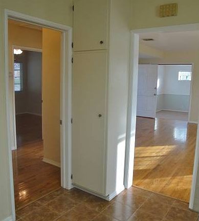 Kitchen leads to Living R