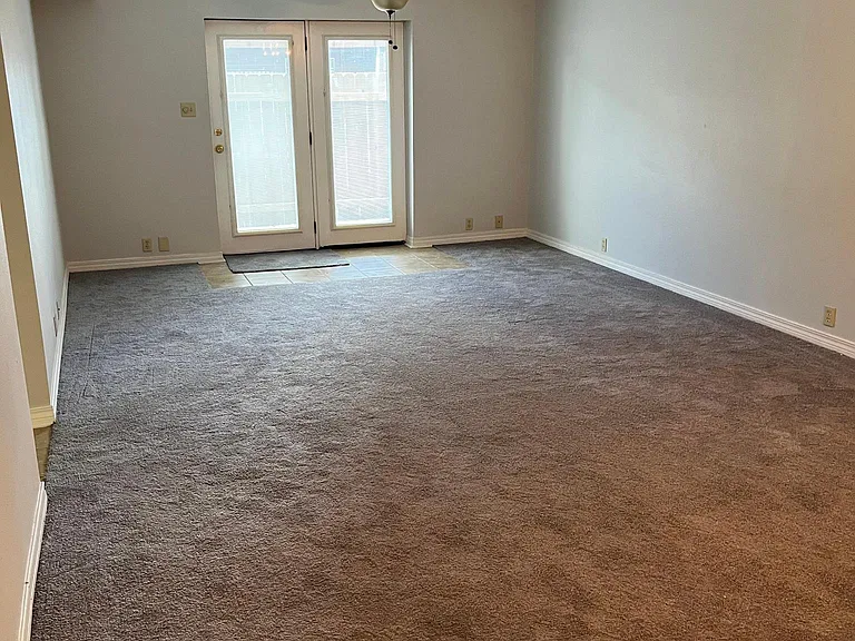 Living room/door to patio