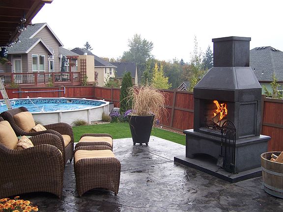 Outdoor living fireplace, garden, pool 