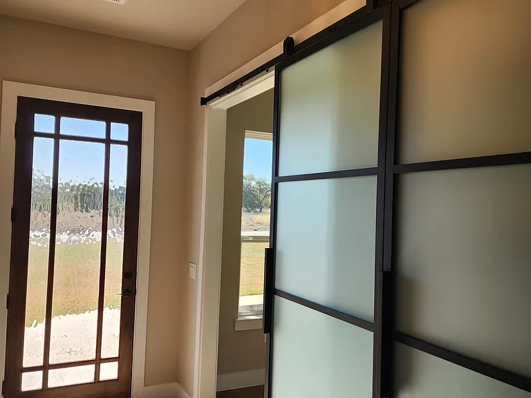 Bonus room off entry with bar door