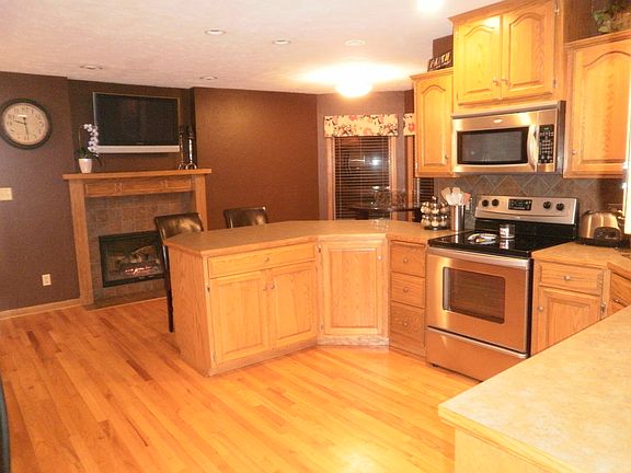 Kitchen & 2-Sided Fireplace