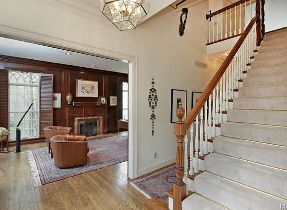 Another view of entry hall looking towards living room/library.