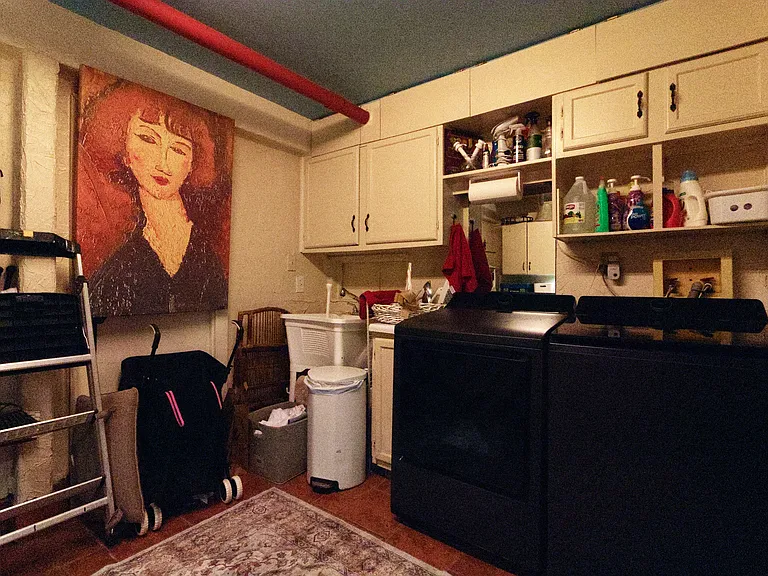 Large laundry room with brand new LG washer and dryer