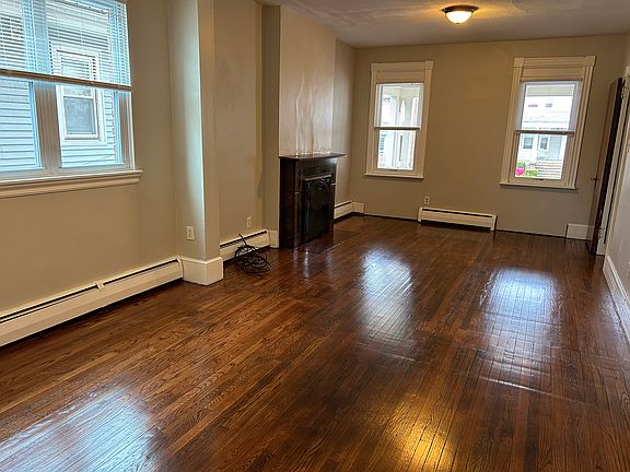 Extra Large Living Room with Hardwood floors throughout the unit