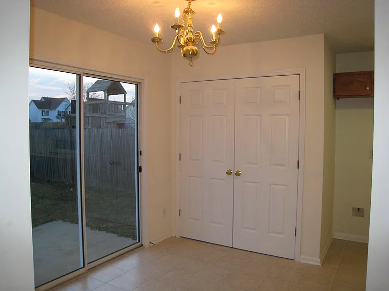 dining area and laundry area in double door.