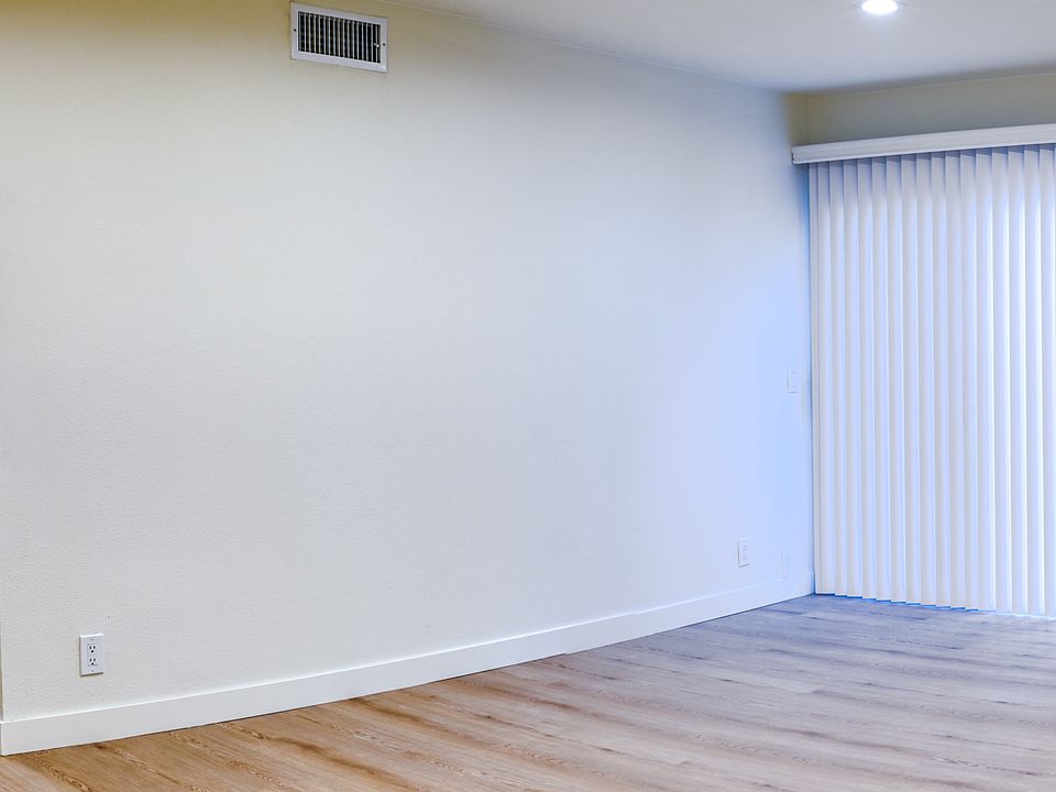 Living Room, Fireplace, Patio Slider. Looking at Dining Room/Kitchen.