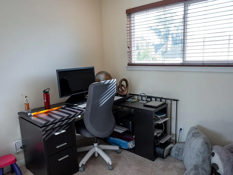 Office room/ bedroom 4 with carpets before which have now been replaced with wooden flooring
