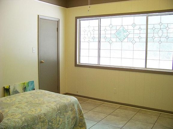 bedroom with stained glass