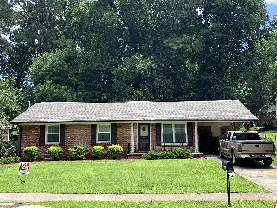 FRONT VIEW OF HOUSE. NEW ROOF, NEW PAINT, NEW WINDOWS, FREE LANDSCAPE MAINTENANCE,, SIDEWALK NEIGHBORHOOD.