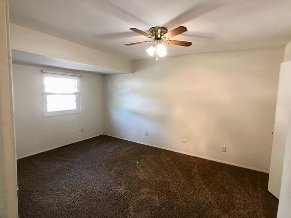 The Master bedroom is 15'4" by 11'6" and has a ceiling fan and brand new carpet.