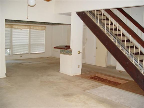 Second view of Den/Family Room open to Formal Dining and Wet Bar.  Great open for entertaining friends and family.
