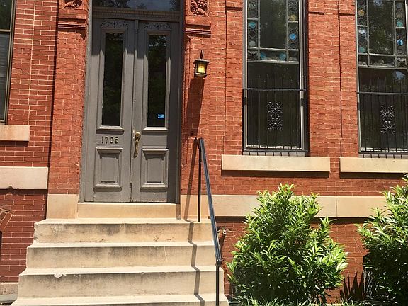 Front entrance. Original stained glass on the first floor