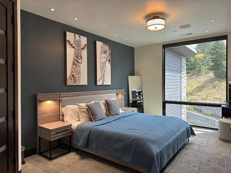 King bed (upper level - left) 
Large closet
Shared bathroom with Office
