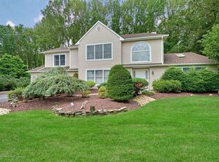 15 Winding Woods Way, Manalapan, NJ