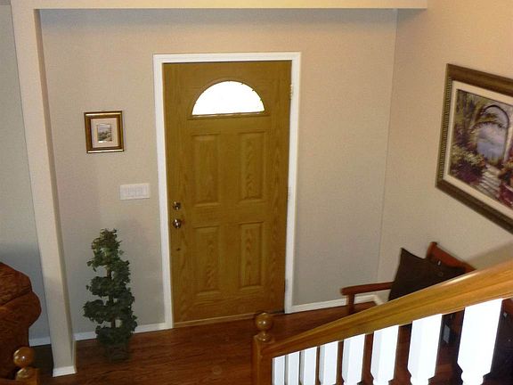 Inviting Entry with Hardwood Floors