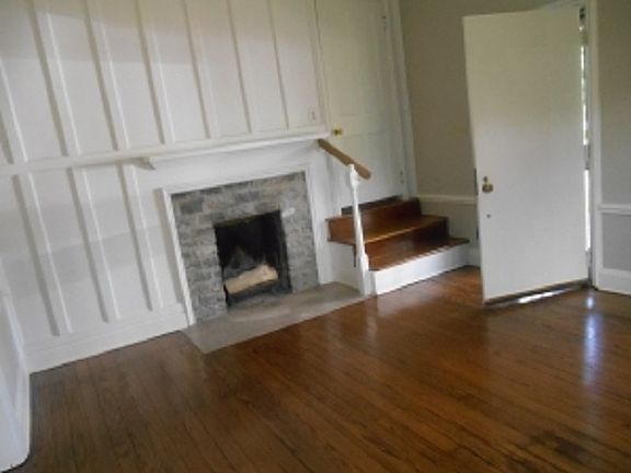 Th living room with a fireplace
