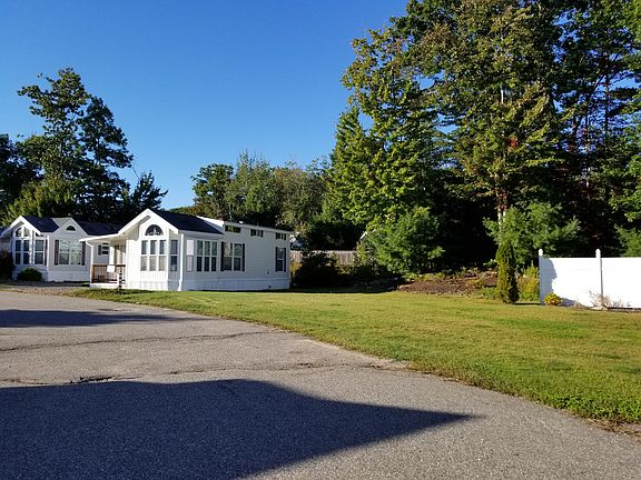 Surrounded by expansive lawn
