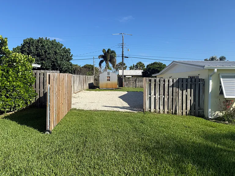 Fence opening to parking pad