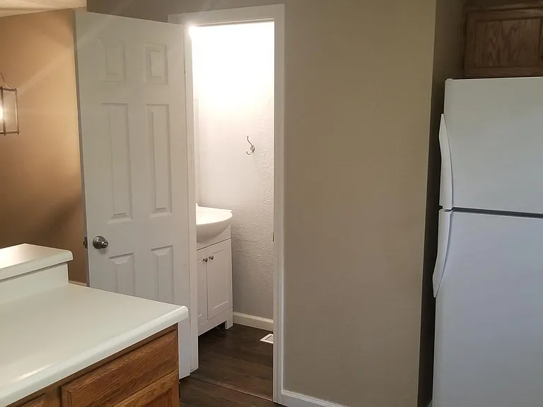 1st Floor- Half bath. Off kitchen
