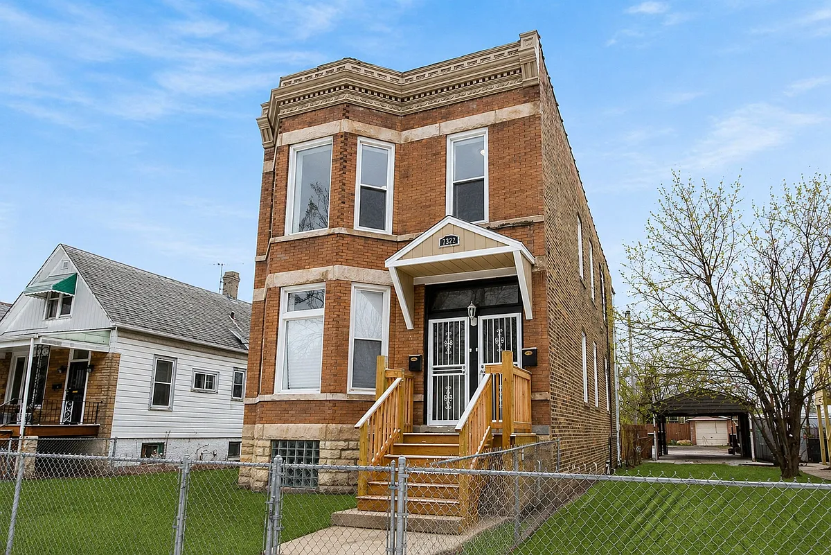 Building Photo - 7322 S Langley Ave #1
