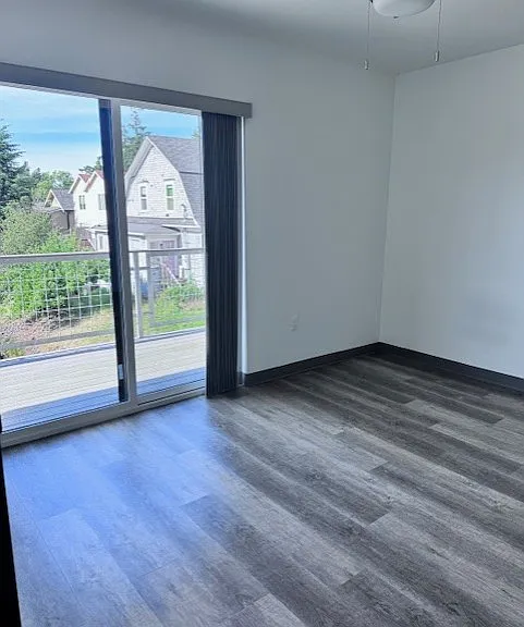 bedroom with slider to private balcony
