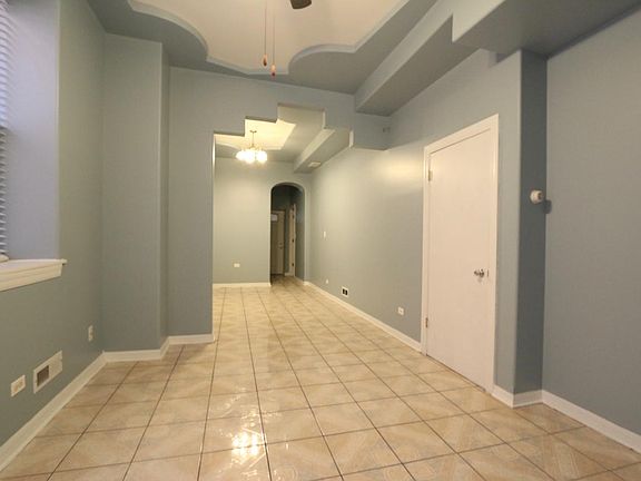 Living room opens to kitchen
