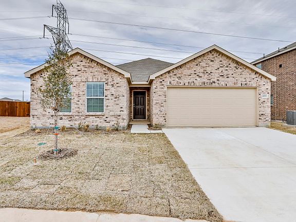 The Rayburn, a one-story home with 2-car garage