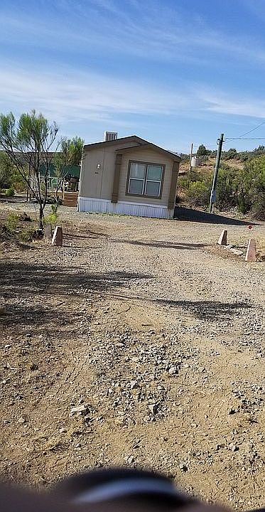 Main driveway to  North end of the building