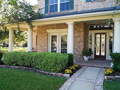 Inviting front porch offers a beautiful first impression.