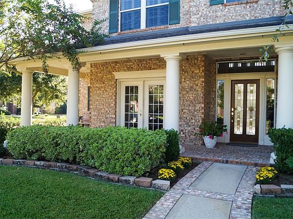Inviting front porch offers a beautiful first impression.