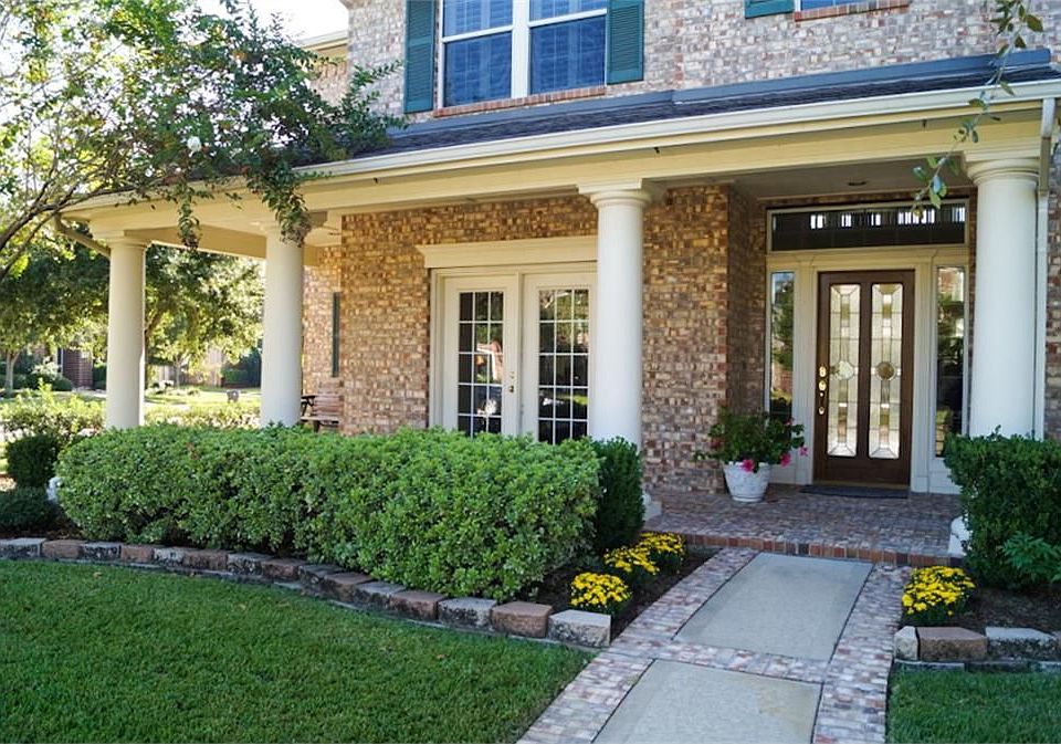 Inviting front porch offers a beautiful first impression.