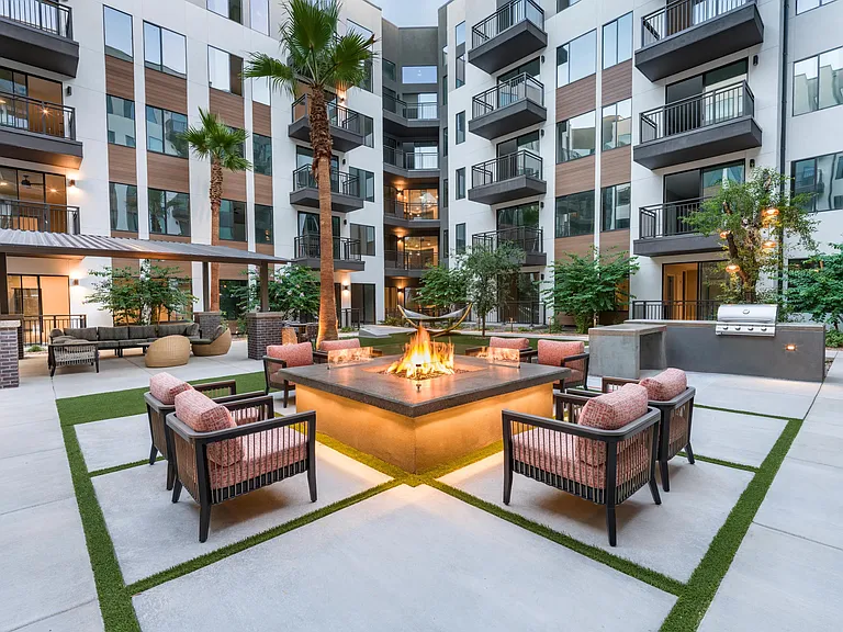 Enjoy the cozy courtyard with friends or solo_featuring firelight, greenery, and grilling stations for a perfect open-air retreat.