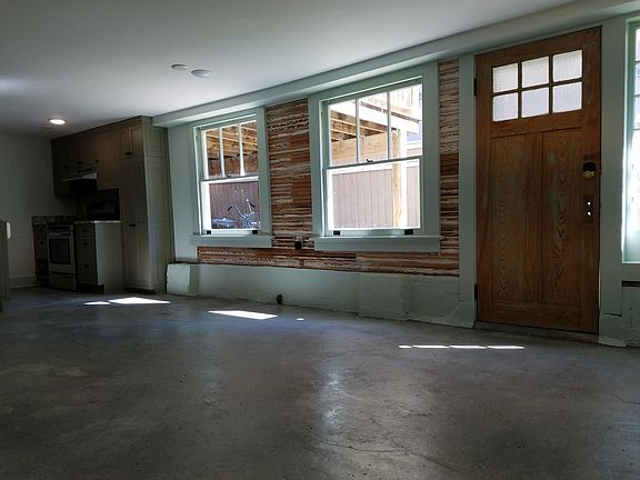 Wide windows and cypress bead board walls