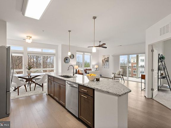 3rd image of 9450 Silver King Ct Unit 203