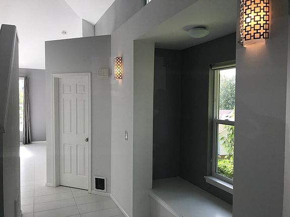 Inviting entrance with powder room on main, plus a cozy nook
