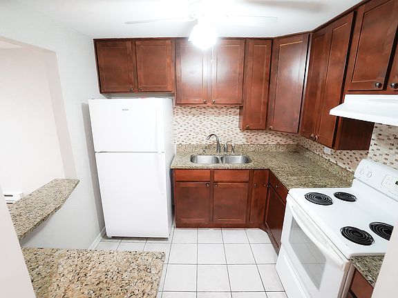 New fridge in kitchen. Kitchen is 7.5' X 8.8'.