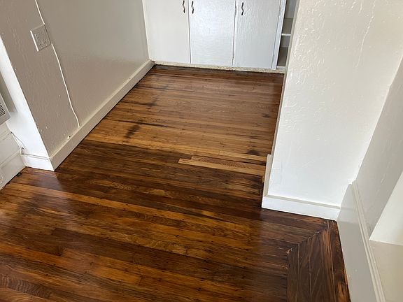 New Paint throughout entire Apartment and highly sanded and varnished oak hardwood floors throughout