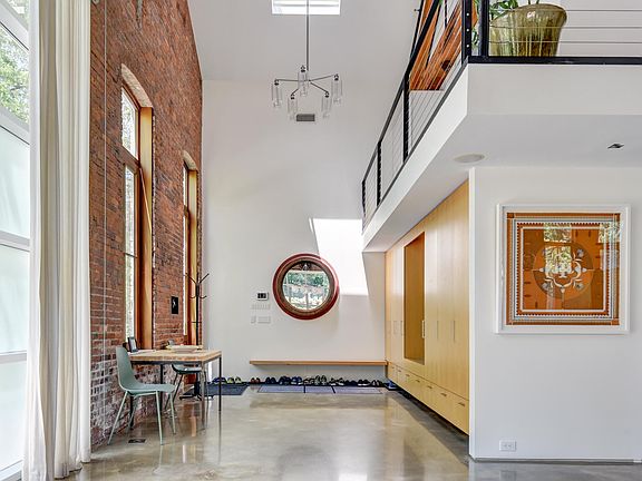 Entrance with many closets and desk