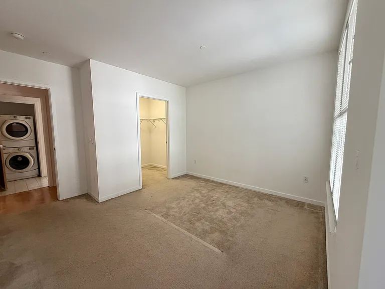 Acoss bedroom from nook area. Washer/dryer in bathroom.