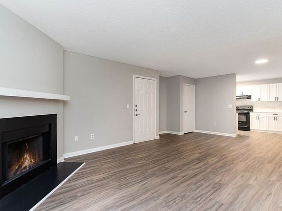 Wood Burning Fireplaces in select apartments